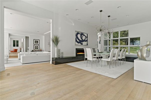 Dining room, Fireplace, Interior, Living room, Pendant Lights, Recessed Lighting, Wood Texture Flooring