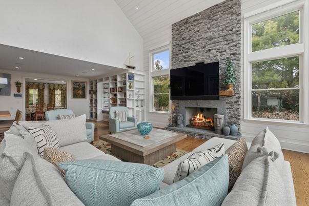 Fireplace, Interior, Living room, Recessed Lighting, Stone Walls, Wood Texture Flooring