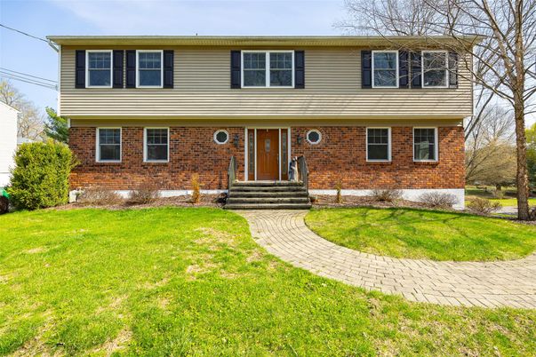 Exterior, Facade, Brick Facade, Raised Ranch