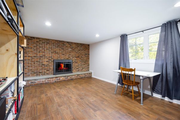 Fireplace, Interior, Recessed Lighting, Stone Walls, Wood Texture Flooring