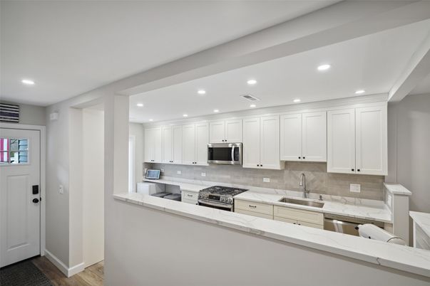 Interior, Kitchen, Recessed Lighting, Stainless Steel Appliances, Wood Texture Flooring