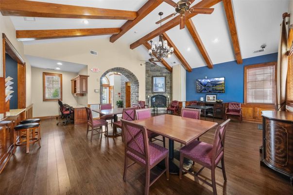 Dining room, Fireplace, Interior, Recessed Lighting, Wooden Beams, Wood Texture Flooring