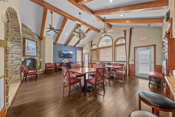 Dining room, Fireplace, Interior, Recessed Lighting, Stone Walls, Wooden Beams, Wood Texture Flooring