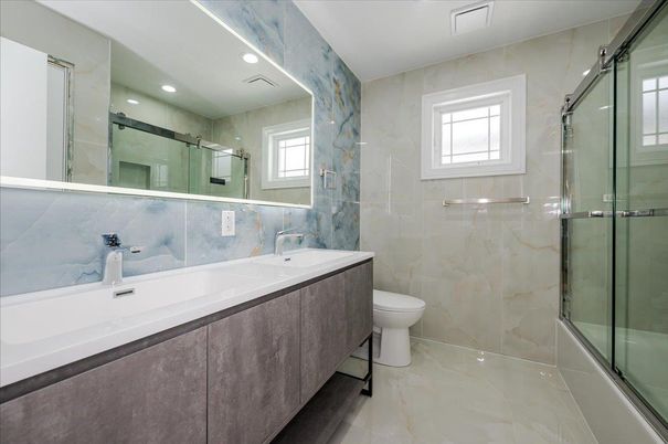Bathroom, Dual Sink Vanities, Glass Shower, Interior, Marble Walls, Recessed Lighting