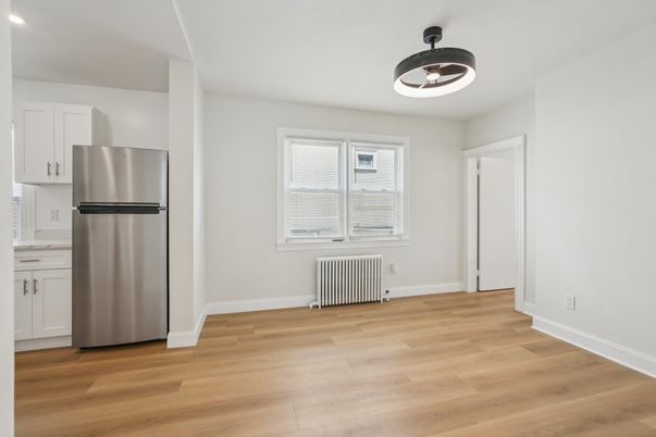 Empty room, Interior, Kitchen, Pendant Lights, Stainless Steel Appliances, Wood Texture Flooring