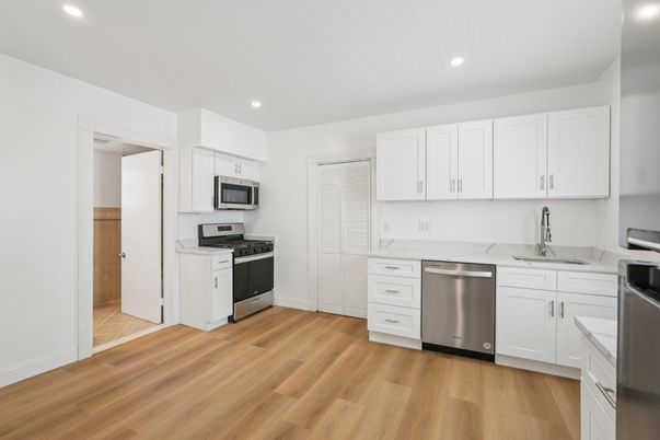 Interior, Kitchen, Recessed Lighting, Stainless Steel Appliances, Wood Texture Flooring