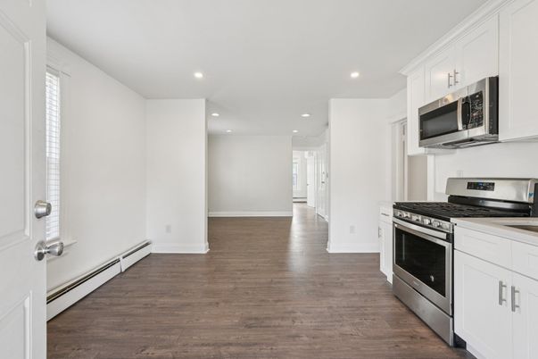 Interior, Kitchen, Recessed Lighting, Stainless Steel Appliances, Wood Texture Flooring