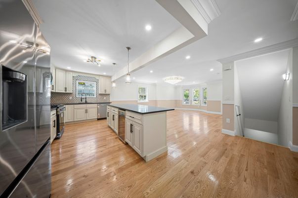 Chandelier, Interior, Kitchen, Pendant Lights, Recessed Lighting, Stainless Steel Appliances, Wood Texture Flooring