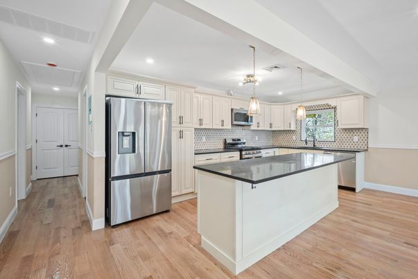 Interior, Kitchen, Pendant Lights, Recessed Lighting, Stainless Steel Appliances, Wood Texture Flooring