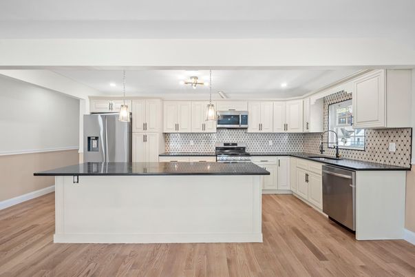 Interior, Kitchen, Pendant Lights, Recessed Lighting, Stainless Steel Appliances, Wood Texture Flooring