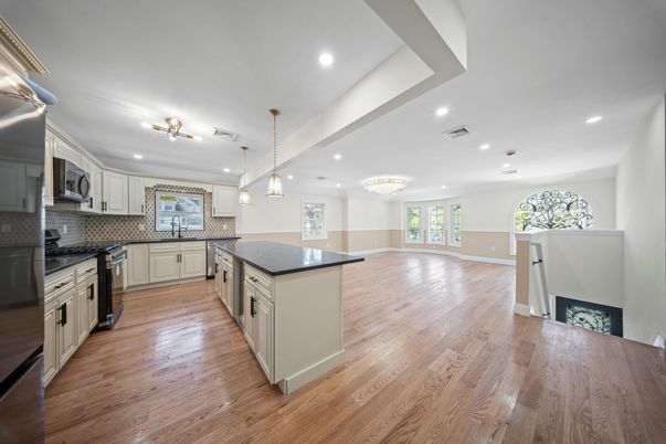 Chandelier, Interior, Kitchen, Pendant Lights, Recessed Lighting, Stainless Steel Appliances, Wood Texture Flooring