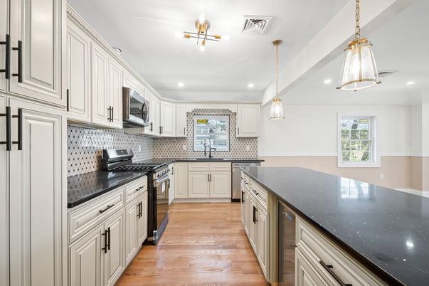 Interior, Kitchen, Pendant Lights, Recessed Lighting, Stainless Steel Appliances, Wood Texture Flooring