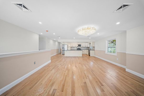 Chandelier, Empty room, Interior, Kitchen, Recessed Lighting, Stainless Steel Appliances, Wood Texture Flooring