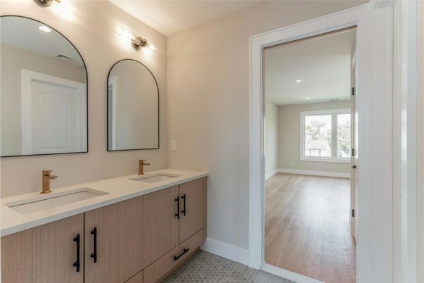 Bathroom, Dual Sink Vanities, Interior, Recessed Lighting, Wood Texture Flooring