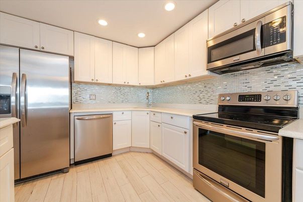 Interior, Kitchen, Recessed Lighting, Stainless Steel Appliances, Wood Texture Flooring