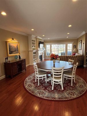 Dining room, Fireplace, Interior, Recessed Lighting, Wood Texture Flooring