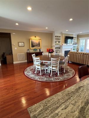 Dining room, Fireplace, Interior, Recessed Lighting, Wood Texture Flooring