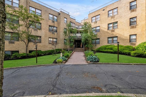 Exterior, Facade, Brick Facade, Condo Building