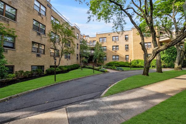Exterior, Facade, Brick Facade, Condo Building