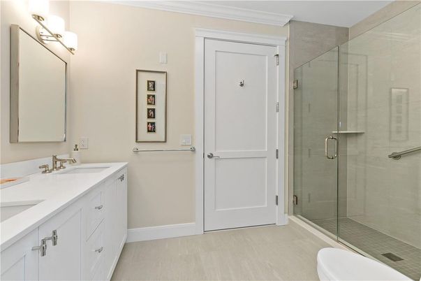 Bathroom, Dual Sink Vanities, Glass Shower, Interior, Wood Texture Flooring