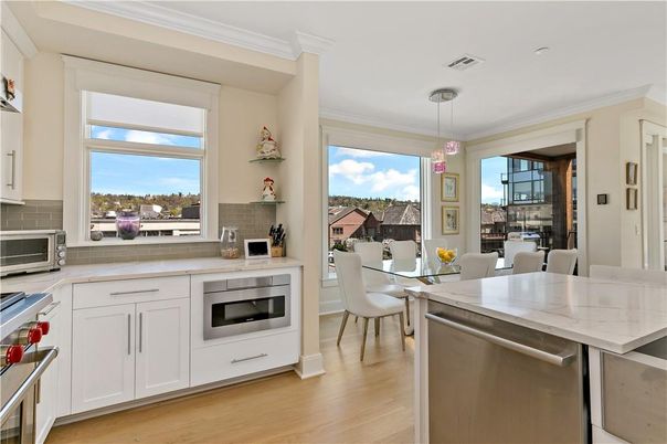 Dining room, Interior, Kitchen, Pendant Lights, Stainless Steel Appliances, Wood Texture Flooring
