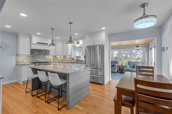 Dining room, Interior, Kitchen, Living room, Pendant Lights, Recessed Lighting, Stainless Steel Appliances, Wood Texture Flooring