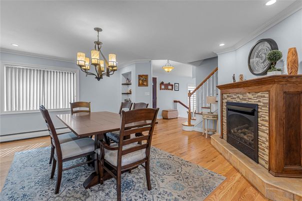 Chandelier, Dining room, Fireplace, Interior, Recessed Lighting, Wood Texture Flooring