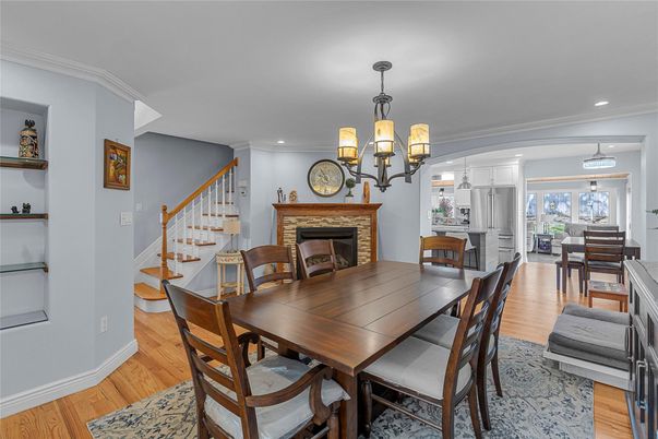 Chandelier, Dining room, Fireplace, Interior, Recessed Lighting, Wood Texture Flooring