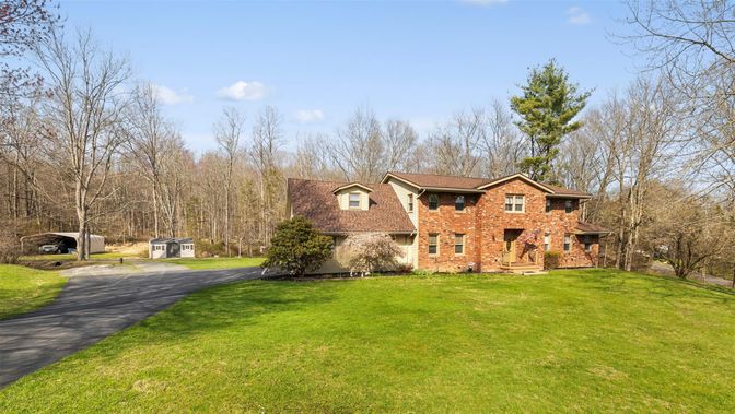 Attached, Backyard, Exterior, Facade, Brick Facade, French Provincial