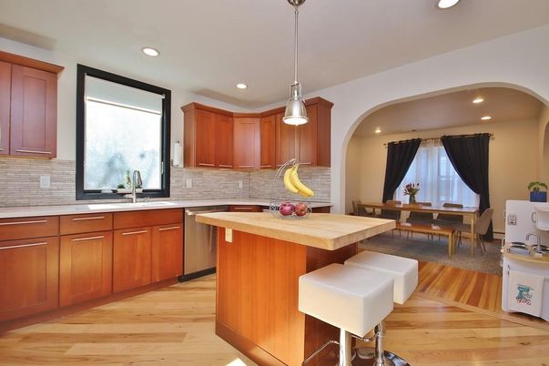 Dining room, Interior, Kitchen, Pendant Lights, Recessed Lighting, Stainless Steel Appliances, Wood Texture Flooring