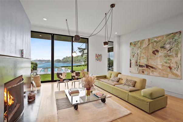 Fireplace, Interior, Living room, Pendant Lights, Recessed Lighting, Water, Wood Texture Flooring