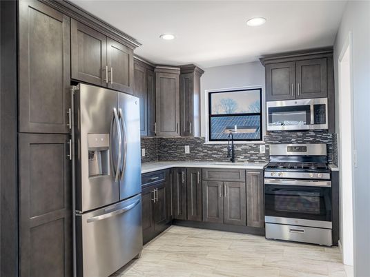 Interior, Kitchen, Recessed Lighting, Stainless Steel Appliances, Wood Texture Flooring