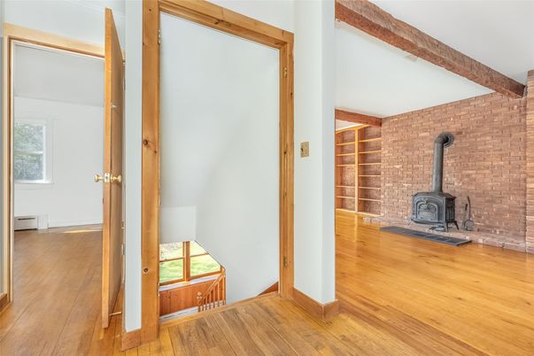 Empty room, Fireplace, Interior, Stone Walls, Wood Texture Flooring