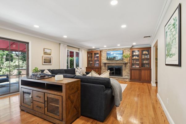 Fireplace, Interior, Living room, Recessed Lighting, Stone Walls, Wood Texture Flooring