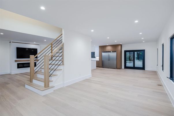 Empty room, Interior, Kitchen, Recessed Lighting, Stainless Steel Appliances, Wood Texture Flooring