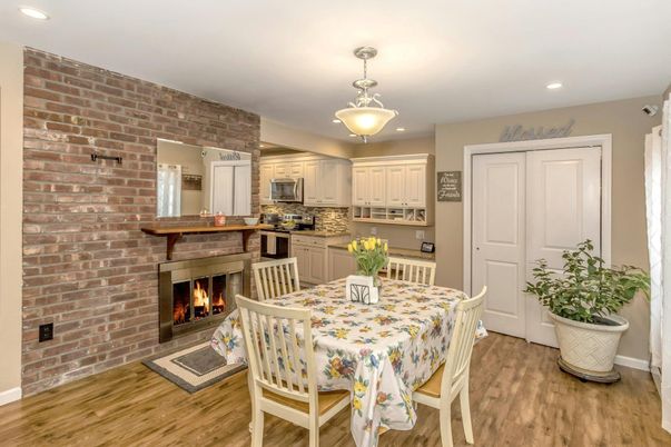 Dining room, Fireplace, Interior, Kitchen, Pendant Lights, Recessed Lighting, Stone Walls, Wood Texture Flooring