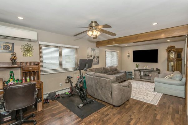 Fitness Equipment, Home Office, Interior, Living room, Recessed Lighting, Wooden Beams, Wood Texture Flooring