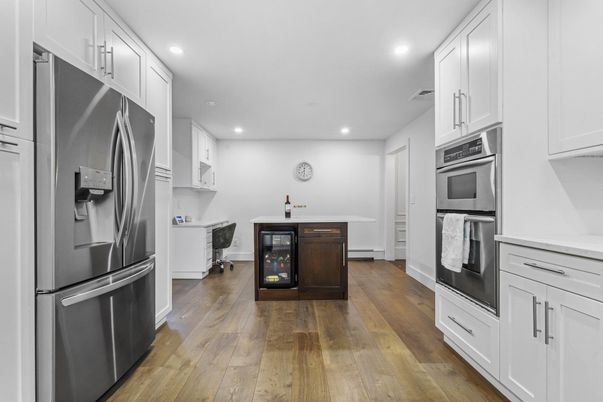 Interior, Kitchen, Recessed Lighting, Stainless Steel Appliances, Wood Texture Flooring