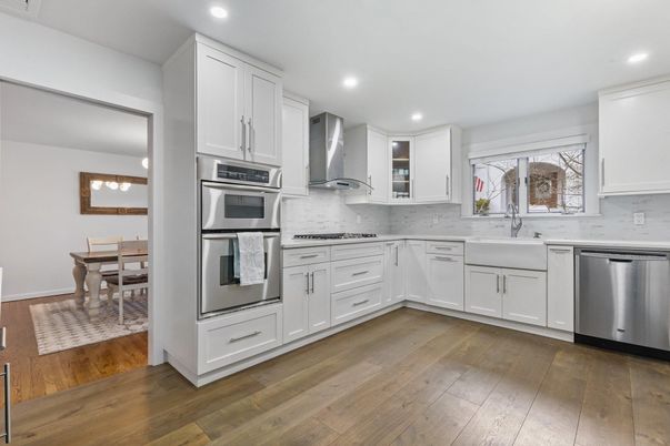 Dining room, Interior, Kitchen, Recessed Lighting, Stainless Steel Appliances, Wood Texture Flooring