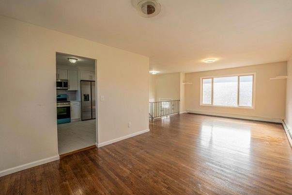 Empty room, Interior, Kitchen, Stainless Steel Appliances, Wood Texture Flooring