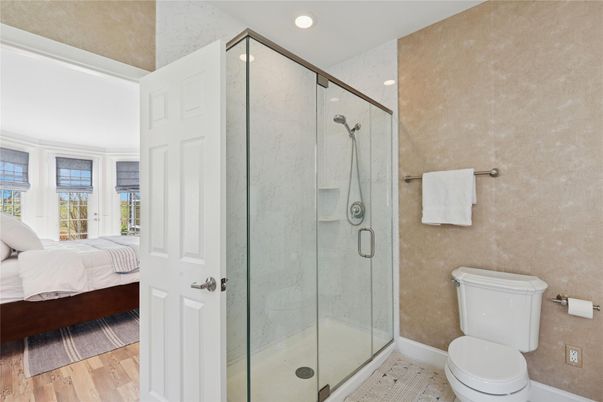 Bathroom, Bedroom, Glass Shower, Interior, Recessed Lighting, Wood Texture Flooring