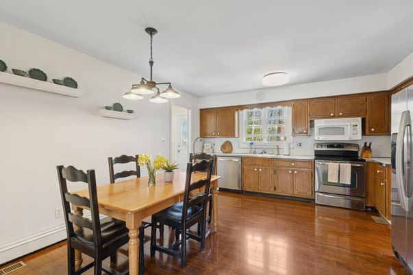 Dining room, Interior, Kitchen, Pendant Lights, Stainless Steel Appliances, Wood Texture Flooring