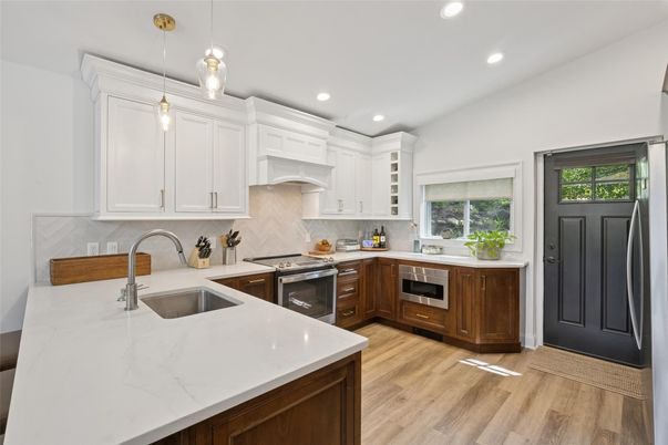 Interior, Kitchen, Pendant Lights, Recessed Lighting, Stainless Steel Appliances, Wood Texture Flooring