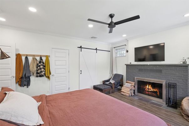 Bedroom, Fireplace, Interior, Recessed Lighting, Wood Texture Flooring