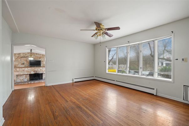 Empty room, Fireplace, Interior, Stone Walls, Wood Texture Flooring