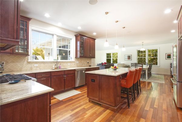 Dining room, Interior, Kitchen, Pendant Lights, Recessed Lighting, Stainless Steel Appliances, Wood Texture Flooring