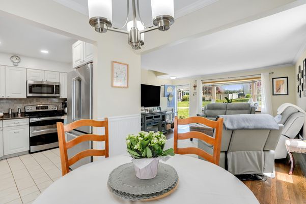 Dining room, Interior, Kitchen, Living room, Recessed Lighting, Stainless Steel Appliances, Wood Texture Flooring