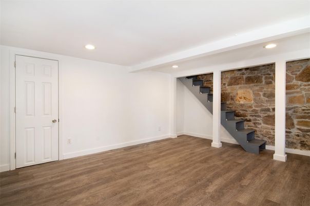 Empty room, Interior, Recessed Lighting, Stone Walls, Wood Texture Flooring