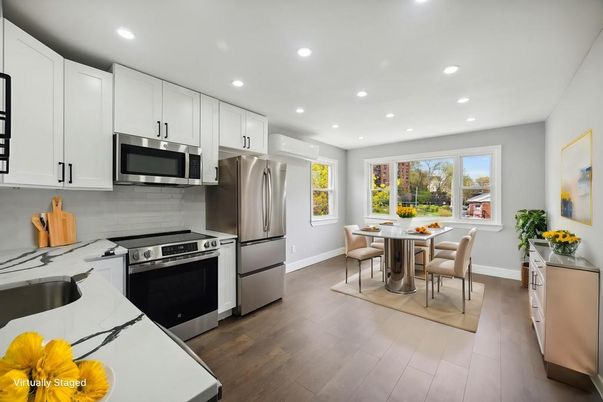 Dining room, Interior, Kitchen, Recessed Lighting, Stainless Steel Appliances, Wood Texture Flooring