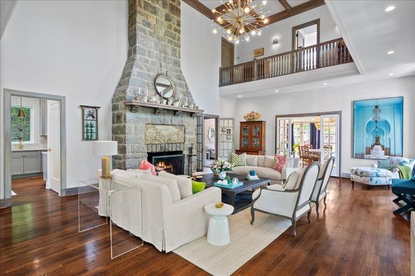 Fireplace, Interior, Living room, Recessed Lighting, Stone Walls, Wood Texture Flooring